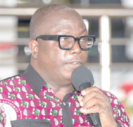 Dr Yaw Amankwa (below), Deputy Director of Health Promotion at the Mental Health Authority, speaking at the workshop 