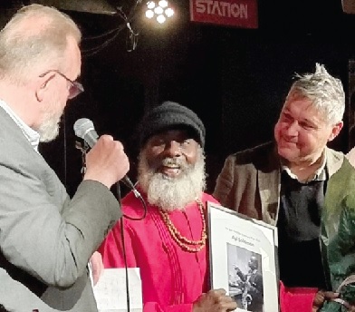 Ayi Solomon (middle) receiving the Ben Webster award in Denmark