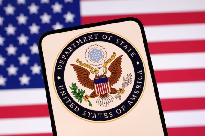 United States Department of State logo and U.S. flag are seen in this illustration taken April 23, 2025. REUTERS/Dado Ruvic/Illustration