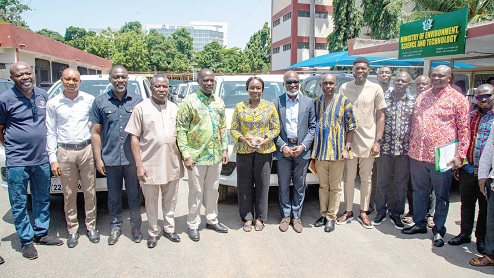 Emmanuel Armah-Kofi Buah (5th from left), acting Minister of Environment, Science and Technology with representatives of the agencies and staff of the ministry