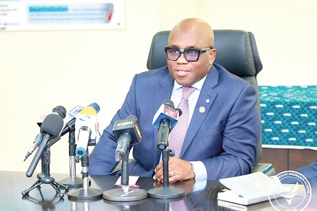Dr Victor Asare Bampoe, Chief Executive Officer, NHIA, addressing the press 