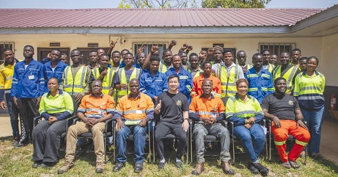 Officials of Cardinal Namdini Mnining Limited and the beneficiairy youth