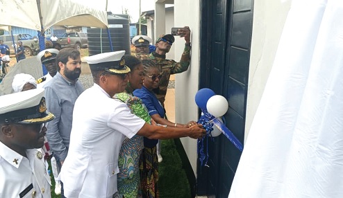 Ebi Bright (middle), MCE for Tema, being assisted by Commodore Solomon Asiedu-Larbi, Flag Officer Commanding Eastern Naval Command and Gifty Agnes Bessing, President of the Naval Wives Association, to cut the ribbon at the inauguration of the production facility.