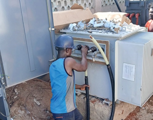 A staff of the ECG working on the facility