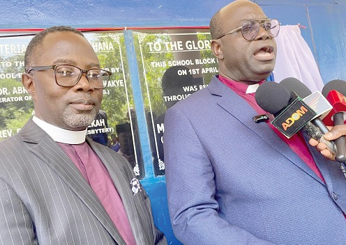 Rt Rev. Dr Opare Kwakye speaking to the media after dedicating the new school block (below). With him is Rev. Raymond Baah Abekah, Chairperson of the West Akyem Presbytery of the PCG.  
