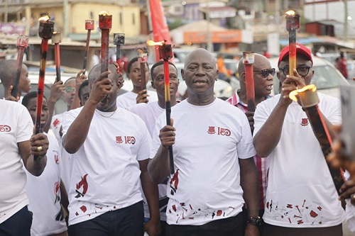 A flame procession through the streets of Cape Coast