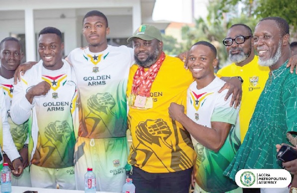 Mayor of Accra Michael Kpakpo Allotey (middle wearing cup) and GAF President Charles Osei Asibey (2nd from right) with some Golden Arms pullers during the event