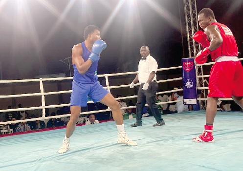 Ghana's Desmond Pappoe in action against Nigerian opponent