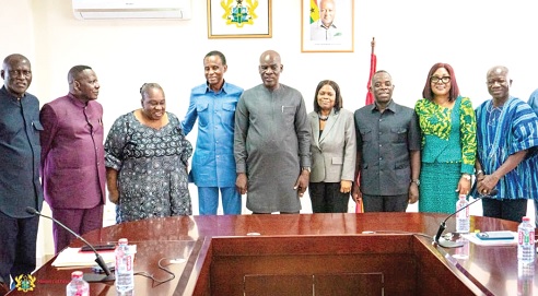 Haruna Iddrisu (5th from left), Education Minister, and Dr Lawerence Akanweeke Kannae (4th from left), Chairman, Civil Service Council, with some council members and managements staff of the ministry after the courtesy call
