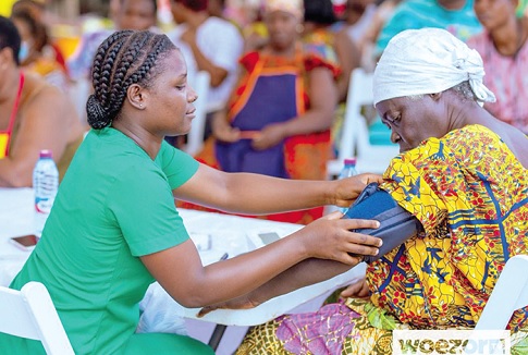 A beneficiary undergoing health checks