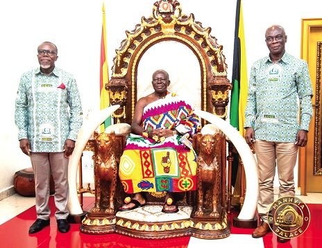 Prof. Ellis Owusu-Dabo (left), Chairman of the Governing Council, and Prof. Eric Kwesi Ofori, Vice-Chancellor of GCU, pose with Otumfuo Osei Tutu I, the Asantehene