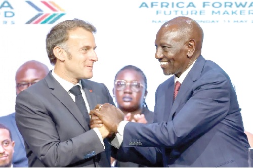 President Emmanuel Macron and President William Ruto exchanging pleasantries at the Africa Forward Summit 2026 in Nairobi, Kenya