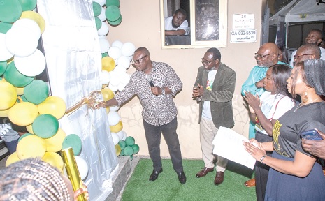 Ben Ohene Ayeh (left), Board Chairman, GTDC, unveiling the new signage of the company while Prof. Kobby Mensah and other officials look on
