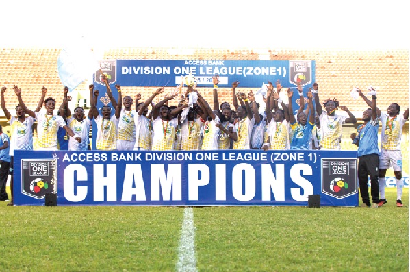 Players and officials of Debibi United celebrating their Ghana Premier League qualification after their playoff victory over Tamale City FC