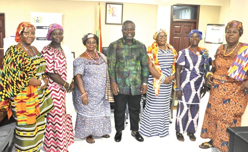 James Gunu (middle), Volta Regional Minister, and the executive of the Volta Queen Mothers’ Association