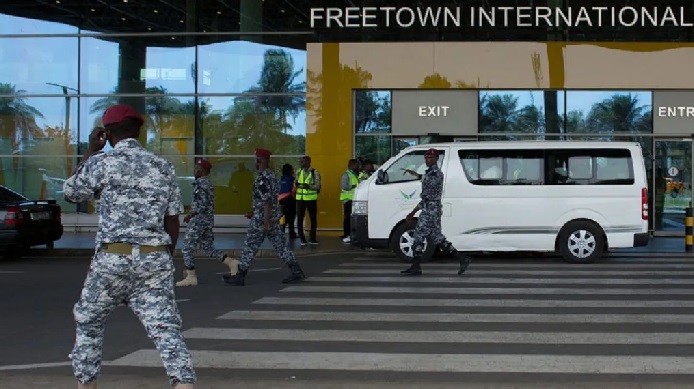 The deportees were escorted from Freetown International Airport in a white van