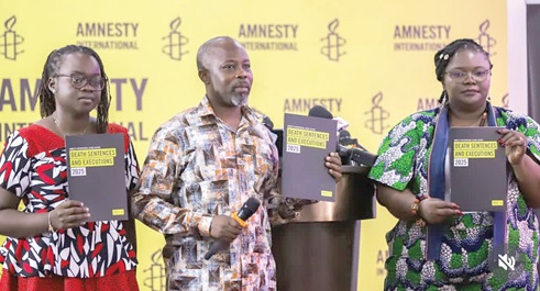 Francis Nyantakyi (middle), Board Chair of Amnesty International Ghana; Charity Batuure, Vice Chair, Amnesty International Ghana (right), and Hannah Osei, acting Country Director, AI-Ghana, launching the report