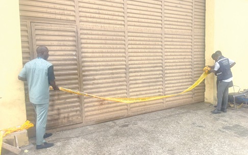 The enforcement team sealing Nyankonton Building Materials company at Oyarifa