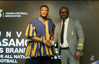 Asamoah Gyan with Mr Kurt Edwin Simeon-Okraku, GFA President