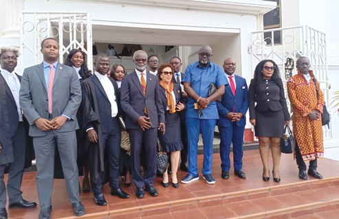 Dr Papa Kwesi Nduom (4th from left) with his legal team and some officials of the company