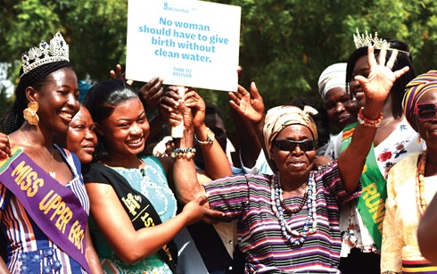Pognaba Christiana Nge (right), Paramount Queenmother of Bongo, together with Asakia Hawawu Hanaan (2nd from right), the campaign ambassador, raising the plaque to mark the launch of the campaign