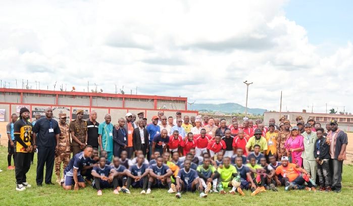 Group photo of inmates with dignitaries including former GFA President Kwesi Nyantakyi, current GFA boss Kurt Simeon-Okraku, MP for Amenfi Central Joana Gyan Cudjoe, Abedi Pele and others