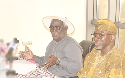 Prof. Kwamena Ahwoi (left), Chairman, Technical Committee, IMCCoD, speaking at the event. With him is Dr Gameli Kewuribe Hoedoafia, Executive Secretary, IMCCoD 