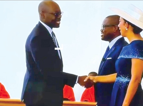 Dr Cassiel Ato Forson, Minister of Finance,  congratulating Romuald Wadagni, Benin President