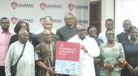 Prof. Wilberforce Sefakor Dzisah (2nd from left), Chair, University of Media, Arts and Communication (UniMAC) Governing Council, and Prof. Eric Opoku Mensah (middle), Vice-Chancellor, with other officials of the School during the unveiling of the Strategic Plan ceremony. Picture: ESTHER ADJORKOR ADJEI
