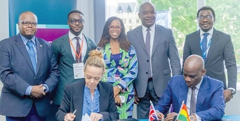 Haruna Iddrisu (right), Education Minister, and Jane Mann, MD, Partnership for Education at Cambridge University Press &amp; Assessment, signing the MoU for their respective institutions