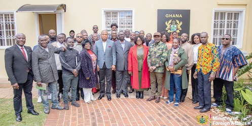 Samuel Okudzeto Ablakwa (middle), Minister of Foreign Affairs, with Ghanaians volunteering to be evacuated from South Africa during his recent visit to South Africa