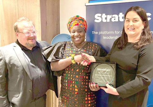Kobi Hemaa Osisiadan-Bekoe (middle), receiving her award