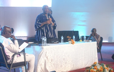 Rev. Dr Samuel Bimpong speaking during the launch of the books. With him is Rev. Dr Frederick P. Deegbe, author of the books