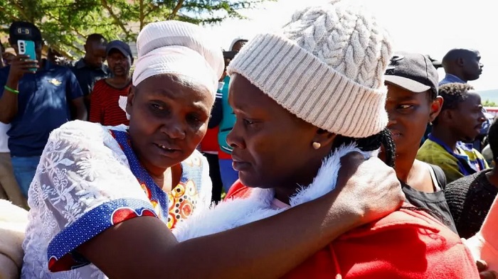 Worried parents and relatives gathered outside the school in Gilgil for news of their children