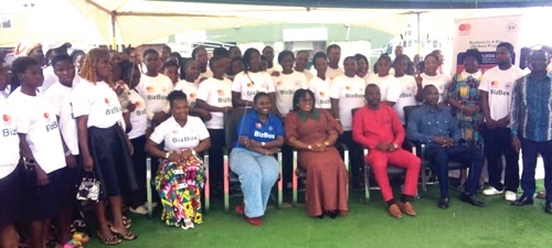 Beneficiaries with dignitaries after the presentation of the start-up kits