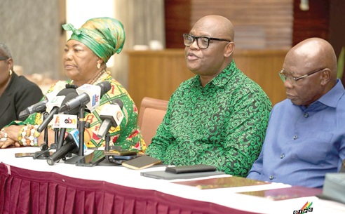 Simon Madjie (middle), CEO, GIPC, with Akwasi Oppong-Fosu (right), Board Chairman, GIPC, and some board members