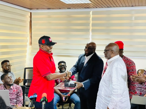 Ace Anan Ankomah (MOBA’84), presenting the Mfantsipim Sesquicentennial Anthology to the Kwadwo Morgan (middle), the Executive Secretary of the 150th Anniversary of Mfantsipim as Captain Johnny Yamoah (right), Chairman of the Anniversary Planning Committee looked on. 