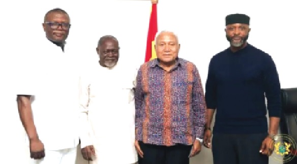Kofi Adams (left), Minister of Sports and Recreation, with the leadership of the IMC