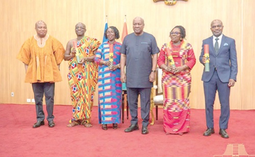 The new envoys Nana Antwiwaa Dodoo (right), Ambassador designate to the Republic of Angola; Louis Kwame Obeng (left), Ambassador designate to the State of Qatar; Evelyn Korantemaa Ofosu-Amable (2nd from left), Ambassador designate to the State of Israel; and Jedidiah Reuben Adogla (2nd from right), Permanent Representative designate to Switzerland, taking their oath of office