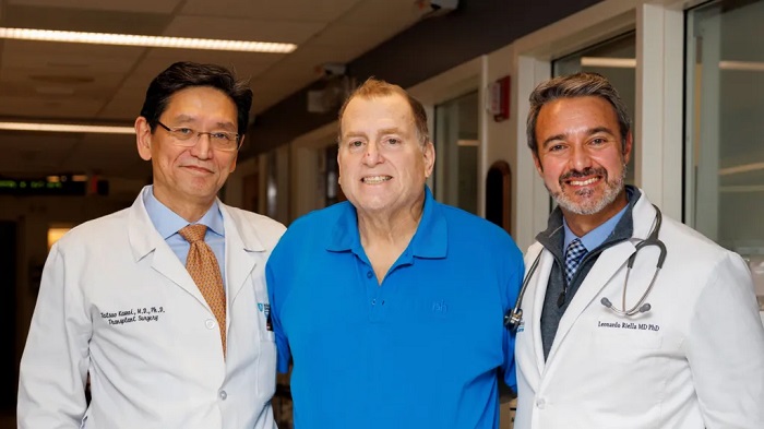 Patient Tim Andrews (centre) with Dr Tatsuo Kawai (left) and Dr Leonardo Riella (right)