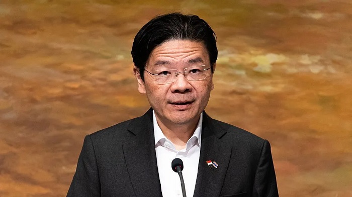Lawrence Wong said the pay raise was necessary to attract talent