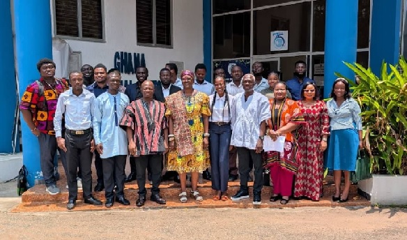 The Ghana Sports Fund members in group photo with some journalists after the engagement