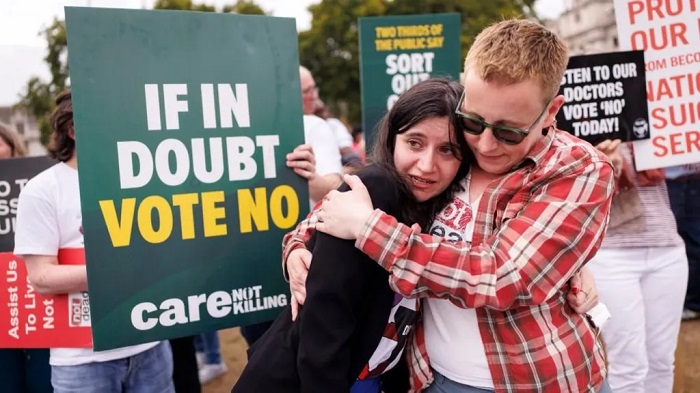 Opponents of the assisted dying bill react after MPs voted against it
