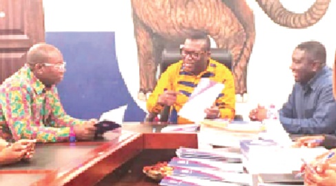 Frederick Opare-Ansah — Chairman, National Officers Elections Committee, NPP, conferring with some members of the committee