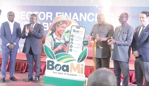 Samuel Nartey George (2nd from left), Minister of Communication, Digital Technology and Innovations, with Prof. Randolph Nsor-Ambala (3rd from right), Chief Executive Officer, DBG, and other dignitaries, launching the “BoaMi” Farmer AI Assistant. Picture: EDNA SALVO KOTEY