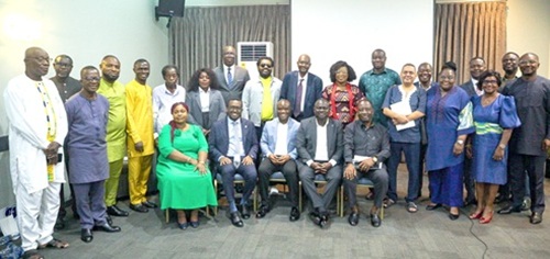 Felix Kwakye Ofosu (seated middle), Minister of State, Government Communications; Albert Kwabena Dwumfour (2nd from right), President of the Ghana Journalists Association; Alex Apau Dadey (right), Executive Chairman of the KGL Group, Omar Faruk Osman (2nd from left), President of the Federation of African Journalists; Rebecca Ekpe (left), Vice President of GJA, with other officials after the event. Picture: CALEB VANDERPUYE