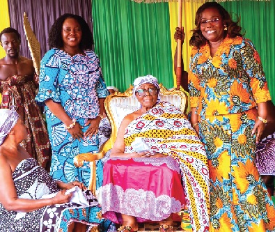 Nana Yaa Akyaa II, Asantehemaa of Asanteman (seated), with Nana Oye Bampoe Addo (right), Deputy Chief of Staff, Administration and Finance and Madam Rita Naa Odoley Sowah, MP for La Dade-Kotopon Constituency during a courtesy call by female government appointees to her palace