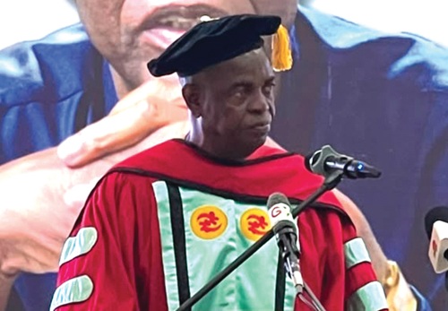 Dr. Kwesi Pratt Junior delivering his speech after he has been presented the certificate of honour