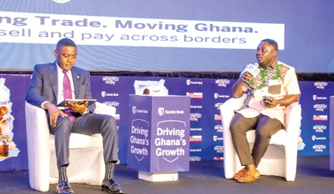 Dr Paa Kwesi Eduaful Abaidoo (right), Sustainability Manager, Miniplast LTD, explaining a point at the Graphic Business/Stanbic Bank Breakfast Meeting. Picture: ELVIS NII NOI DOWUONA