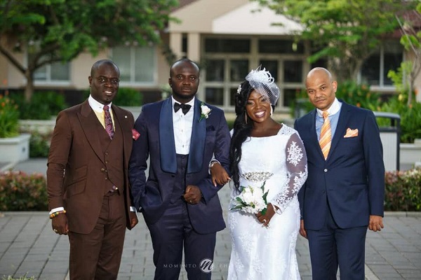 Dr Attoh with her husband, Emmanuel Berko (2nd from left), and her brothers Albert (right) and Nathaniel Attoh (left) on her wedding day